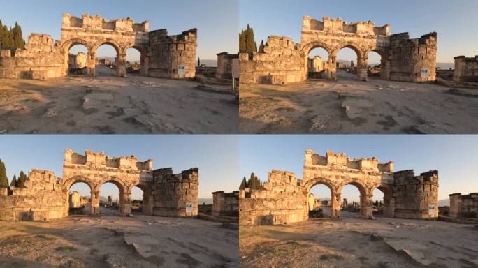 在德尼兹利的Pamukkale，日落时分的Frontinus门和古老的赫拉波利斯遗址广场