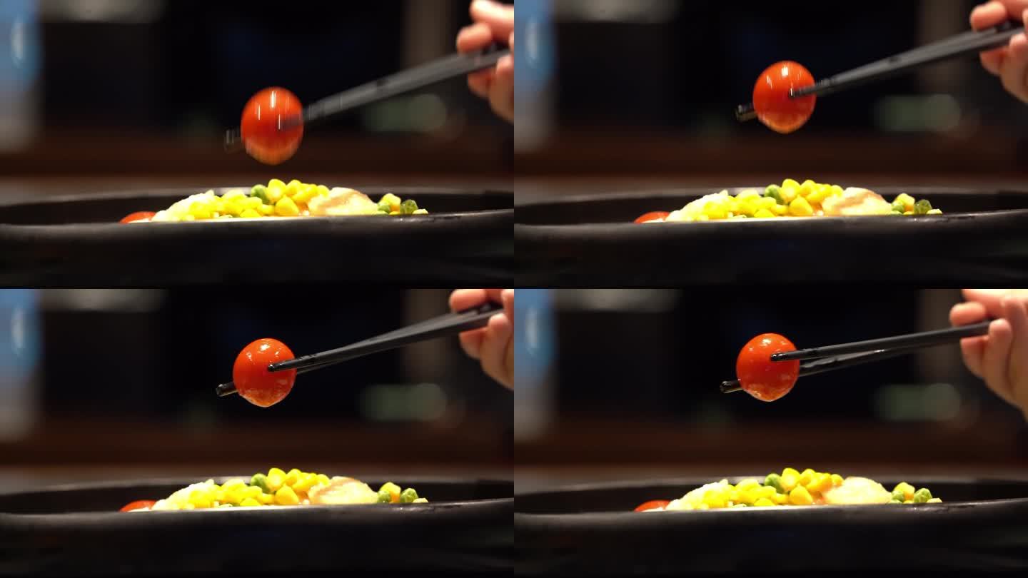 使用筷子夹菜近距离拍摄