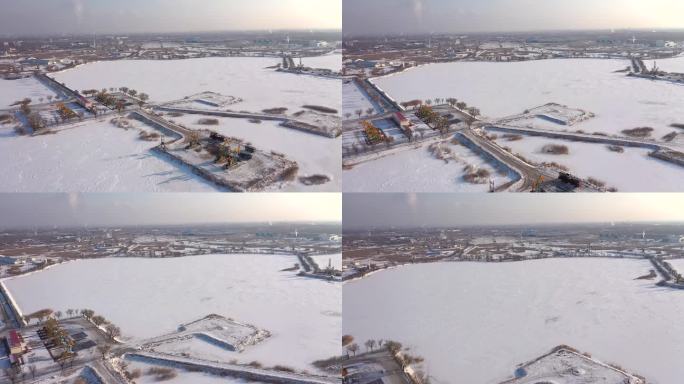 航拍大庆油田大雪过后的采油作业的繁忙景象
