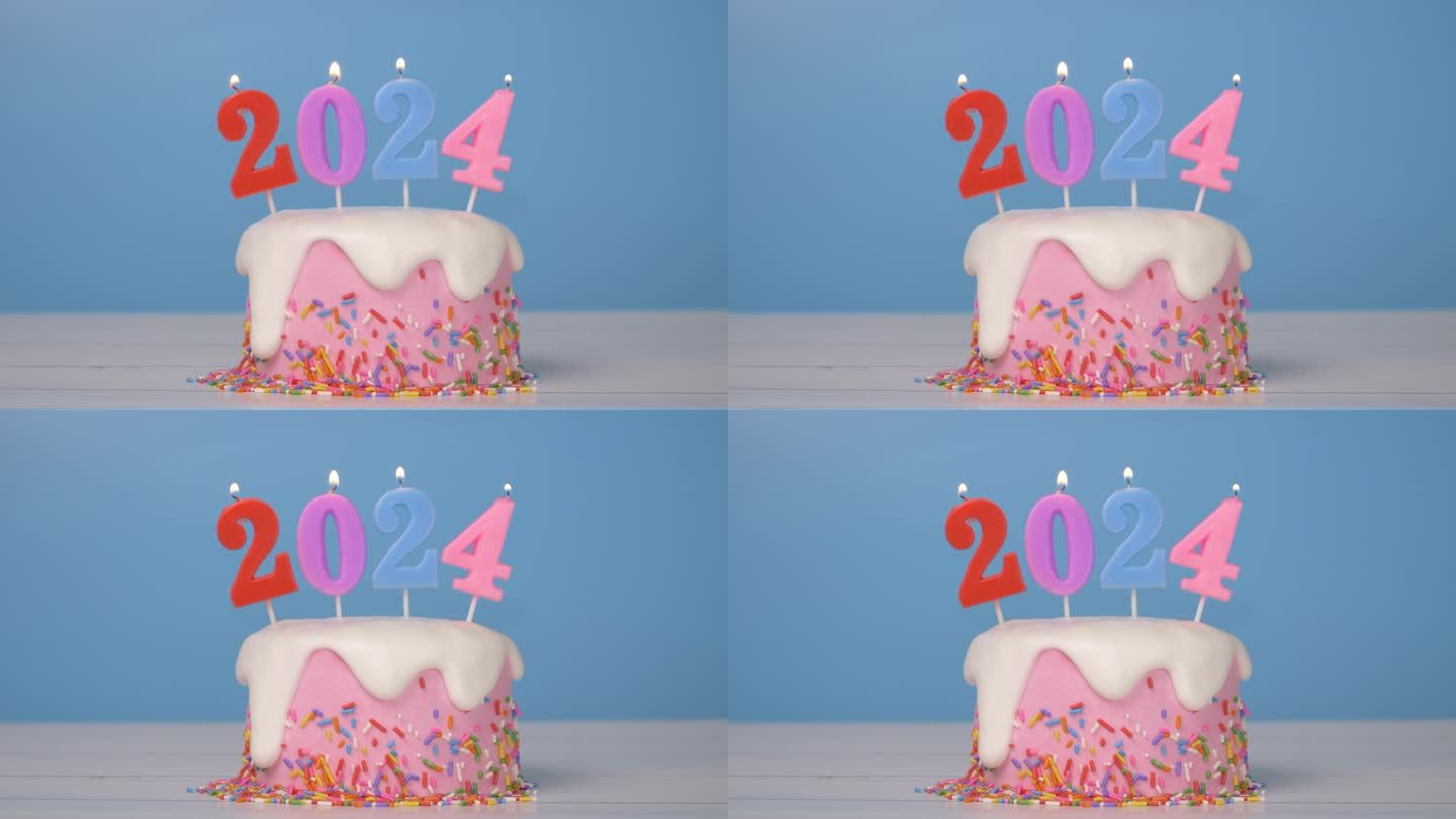 2024年新年快乐，可爱的蛋糕与彩色蜡烛编号2024年新年庆祝派对的无缝循环，火焰在烛芯摇摆和闪烁，