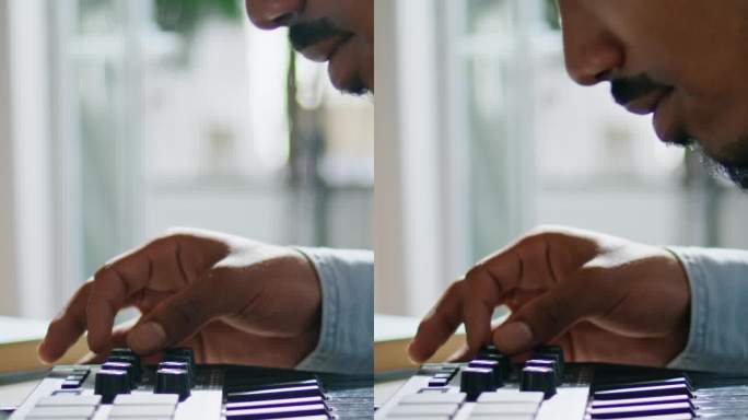 男子手臂使用键盘家用垂直特写。匿名dj触摸控制台