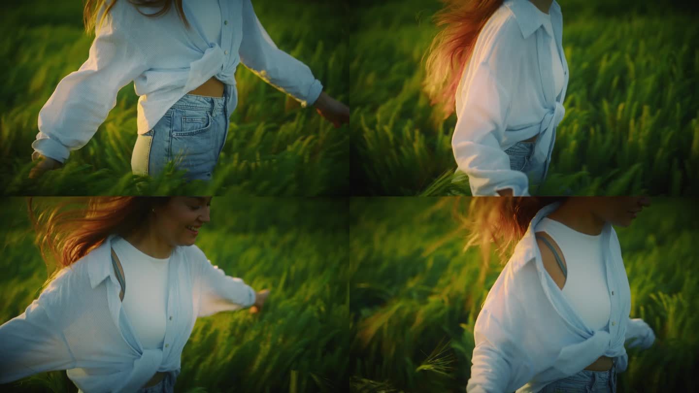 日落时分，兴奋的女子在绿色的小麦地里奔跑