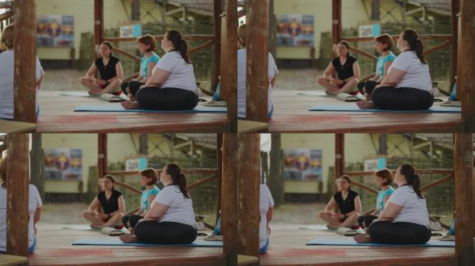 瑜伽放松运动，女性团体健身课程，体型大而苗条的人训练