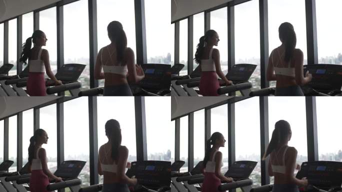 女性在健身俱乐部锻炼。