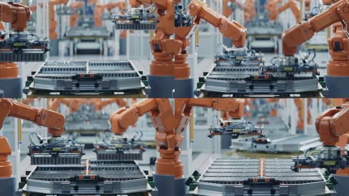 橙色机械臂的自动化生产线特写。用于汽车工业装配的电动汽车电池组延时拍摄。电动汽车智能工厂。配备机械臂