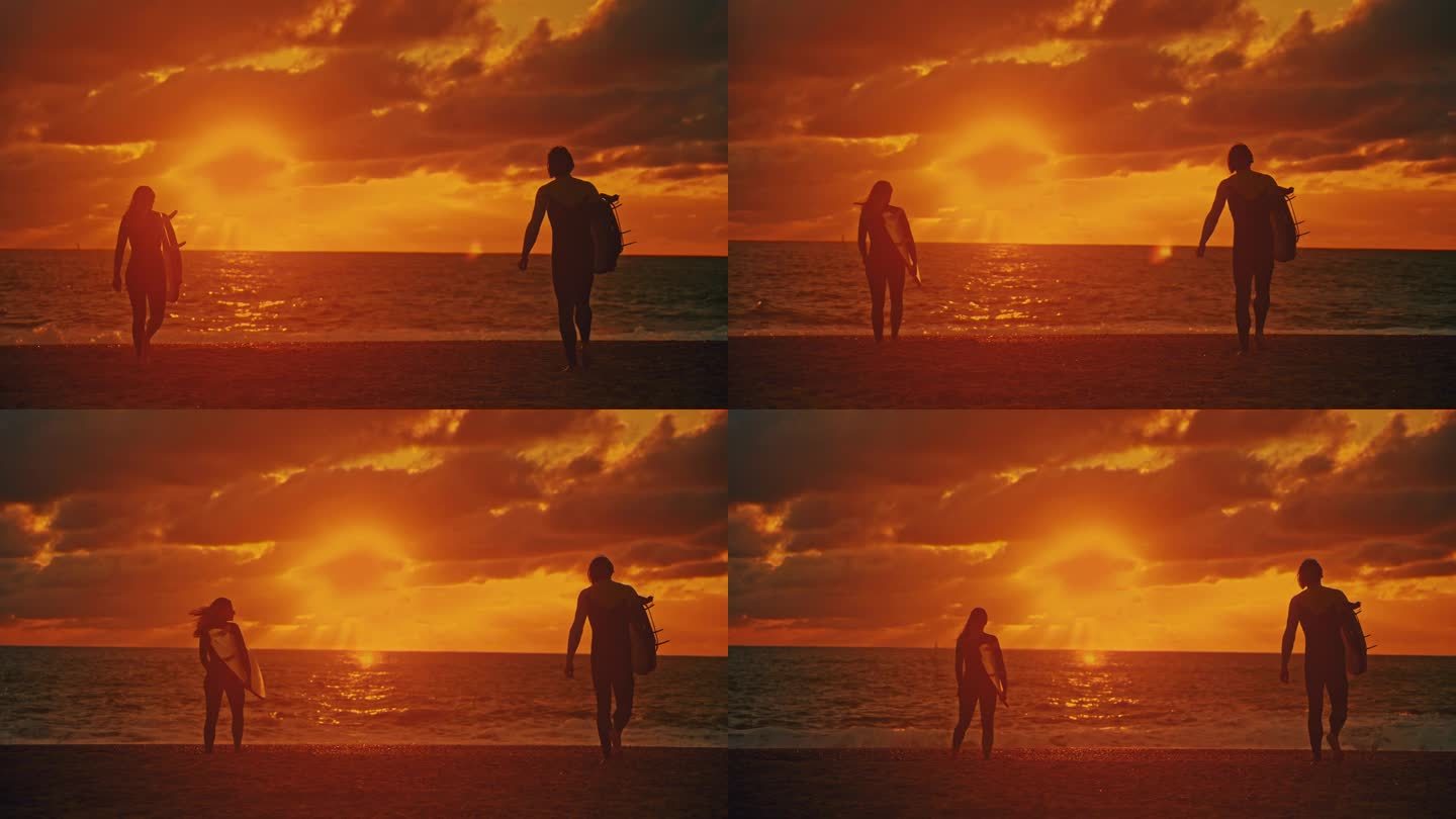 在橙色的夕阳下，一对冲浪者夫妇走向大海