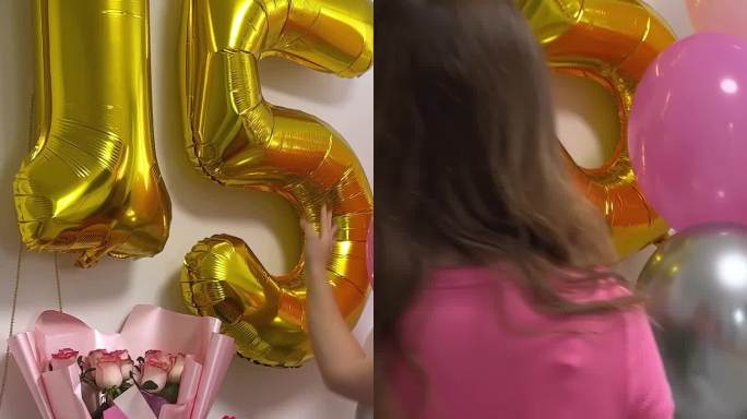 十几岁的女孩庆祝生日15周年气球花白色墙上的数字在互联网上为社交网络拍照假期装饰房间装饰牛仔裤粉红色