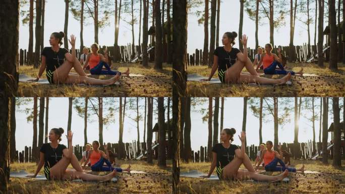夏季瑜伽营，一群女性在大自然中一起训练和伸展