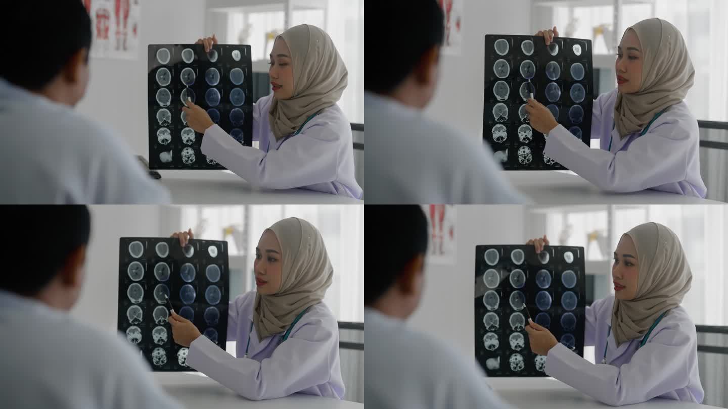 穆斯林女医生和老年男病人在病房里讨论x光片