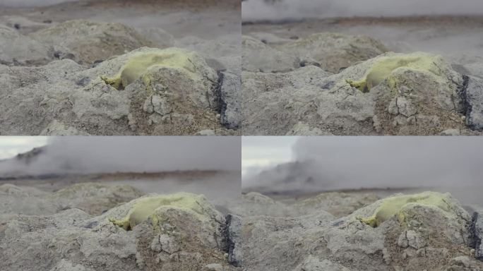 冰岛，浅黄色的蒸汽喷口在地面上喷出蒸汽
