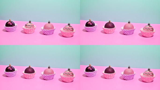 彩色舞蹈:粉彩粉色饰品转变为深紫色在定格运动纸杯蛋糕篮子