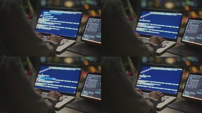 年轻的亚洲女性软件开发人员使用电脑编写代码