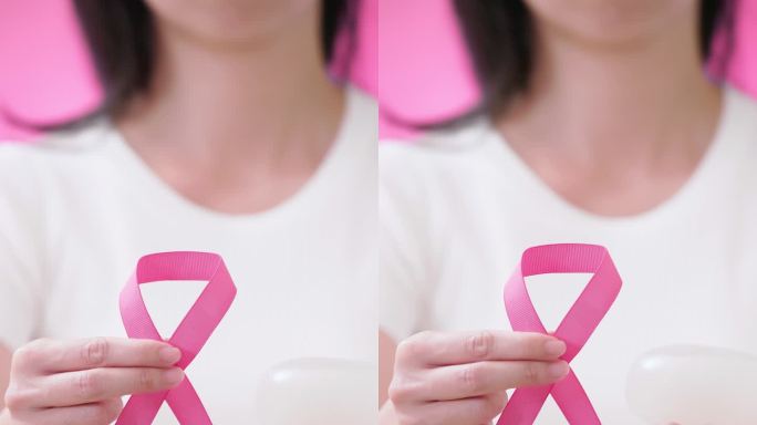 粉色缎带和假乳房关爱乳房硅胶假胸