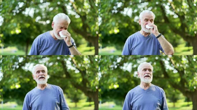 资深活跃的白发大胡子男子患有季节性过敏站立