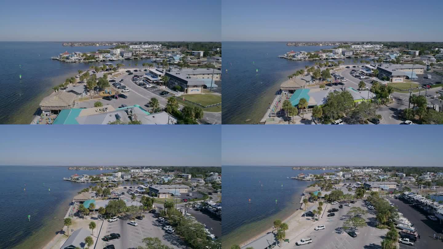 4K无人机视频(多莉拍摄)的海滩公园，酒店和码头在哈德逊海滩在墨西哥湾在佛罗里达州