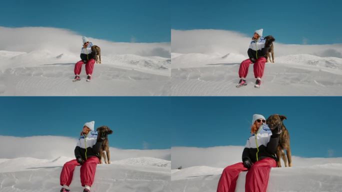 放大画面，一个女人和一只狗站在高高的雪堆上。