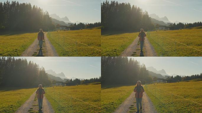 一名妇女在秋天徒步穿越巴伐利亚乡村