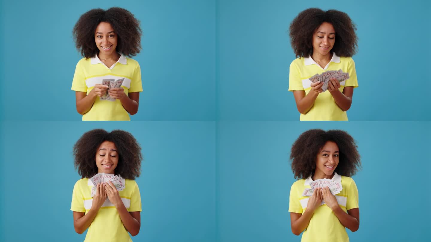 快乐的非裔美国女人用蓝色数钱