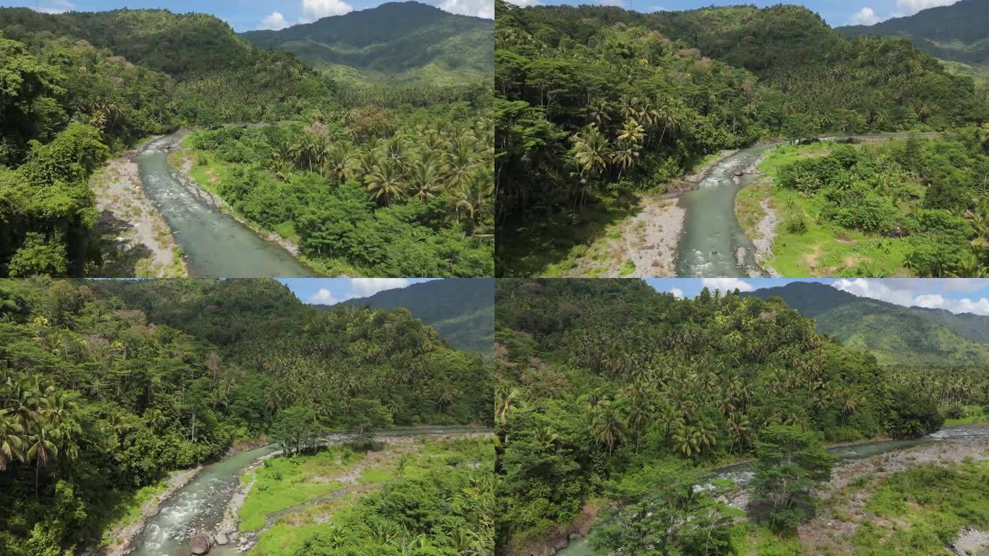 在菲律宾的热带丛林中，无人机沿着圣地亚哥河飞行
