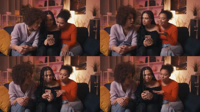 年轻的非裔美国女性朋友刷手机，在社交媒体上闲聊