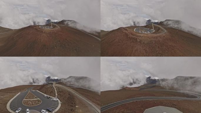 夏威夷毛伊岛航拍v28飞越哈雷阿卡拉的红山，捕捉到山顶上独特的红色火山渣和土壤，以及高海拔的云景——