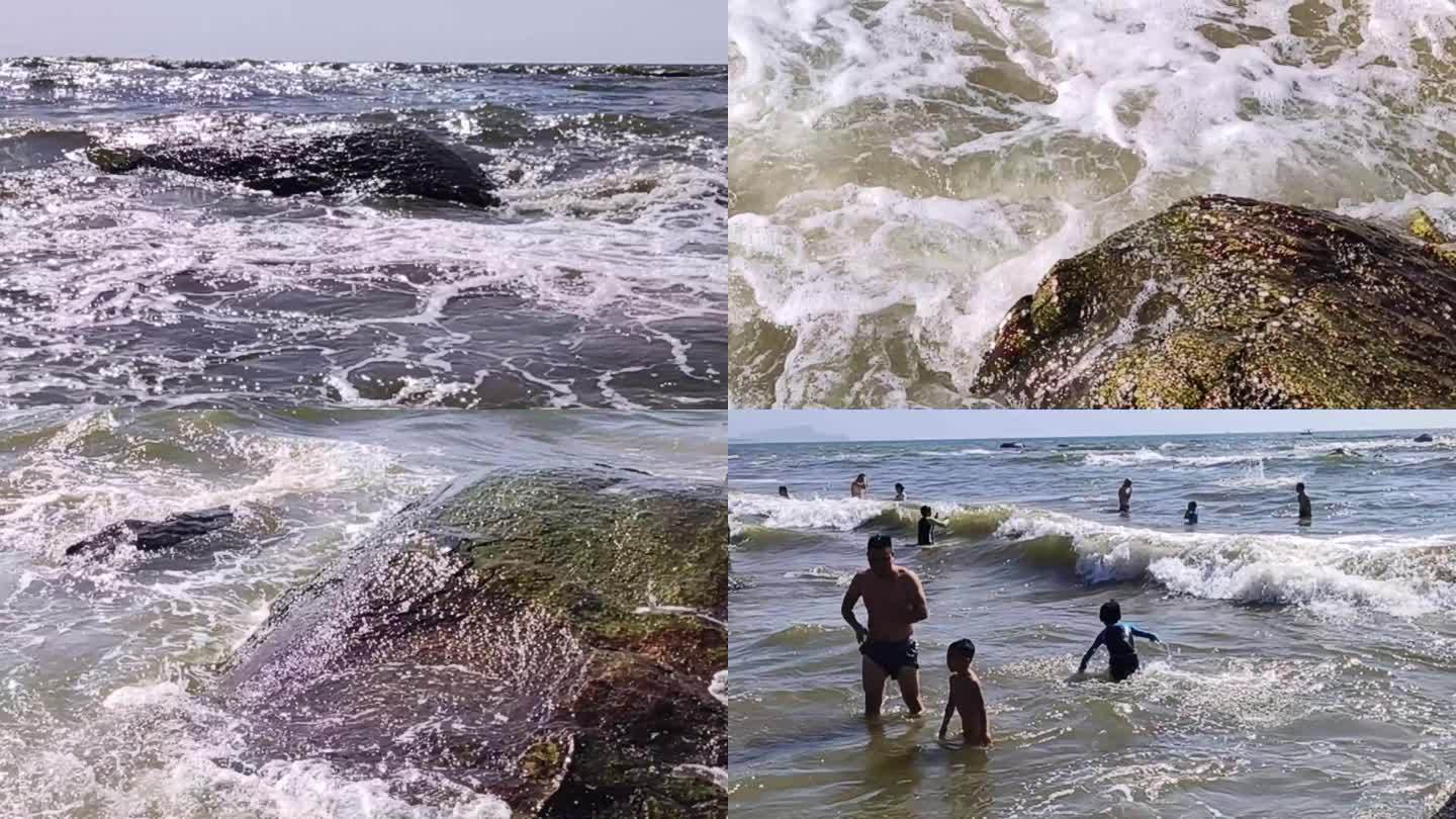 大海冲浪海边游水的人群大海玩水冲浪海浪花