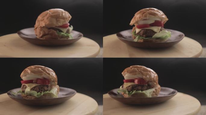 牛肉或鸡肉汉堡美味的汉堡三明治，黑色背景和简单的光设置拍摄RAW 4K