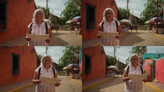 一位年长的女游客在游览旅游小镇时正在使用地图