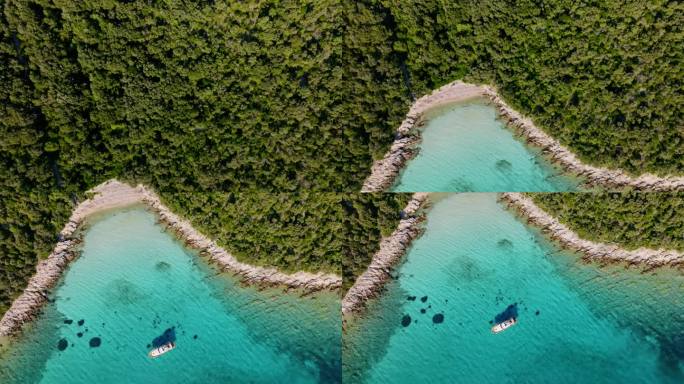 空中游艇停泊在一个阳光明媚的海湾