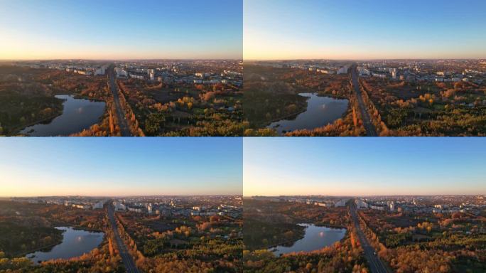 达契亚大道基希讷乌城门的全景空中无人机视图。摩尔多瓦共和国首都基希讷乌的道路，树木，公园，湖泊，建筑