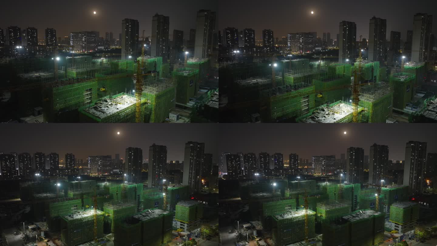 城市大楼建设建筑工地塔吊夜间航拍