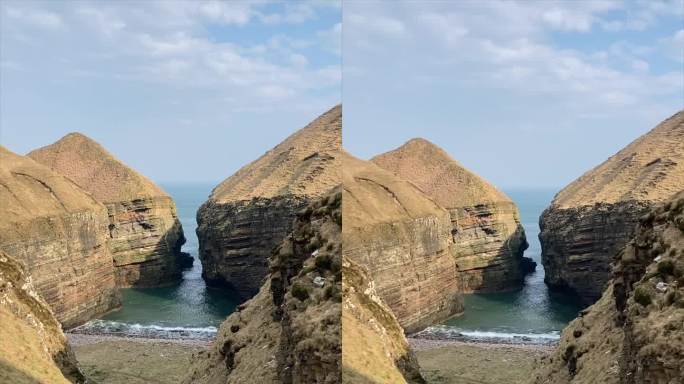 岩石悬崖与海景从海滩