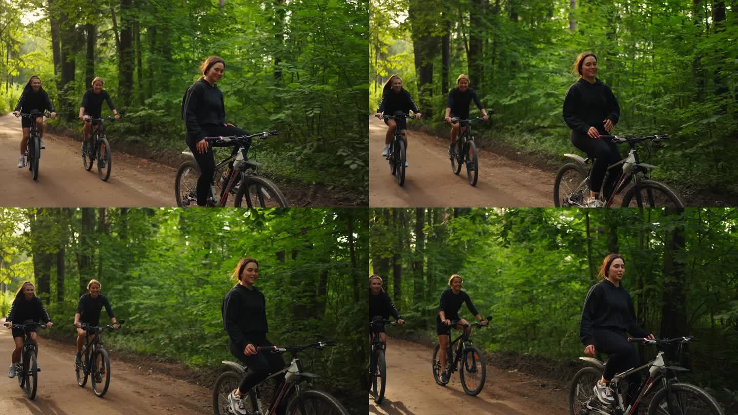 夏天在森林里骑自行车，年轻女性在大自然里骑自行车，健康的生活方式和运动