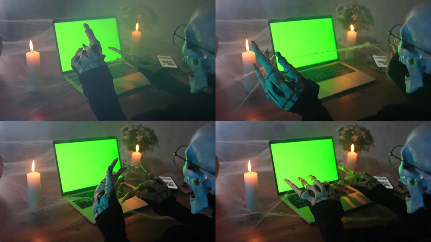 近景中，雾中可怕的死亡角色，在绿屏的笔记本电脑上打出骨手派对邀请函