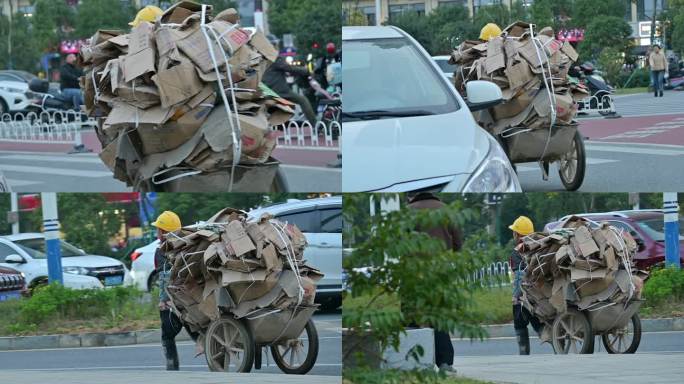 农民工纸皮，废品搬运回收，拉车背影