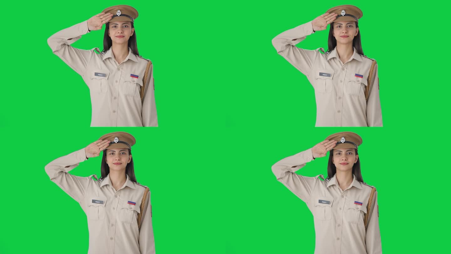 骄傲的印度女警察向绿幕敬礼
