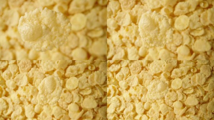 模仿一落，概念一落。早餐的玉米片，从俯视的角度看，在一个特写镜头中，向下落。