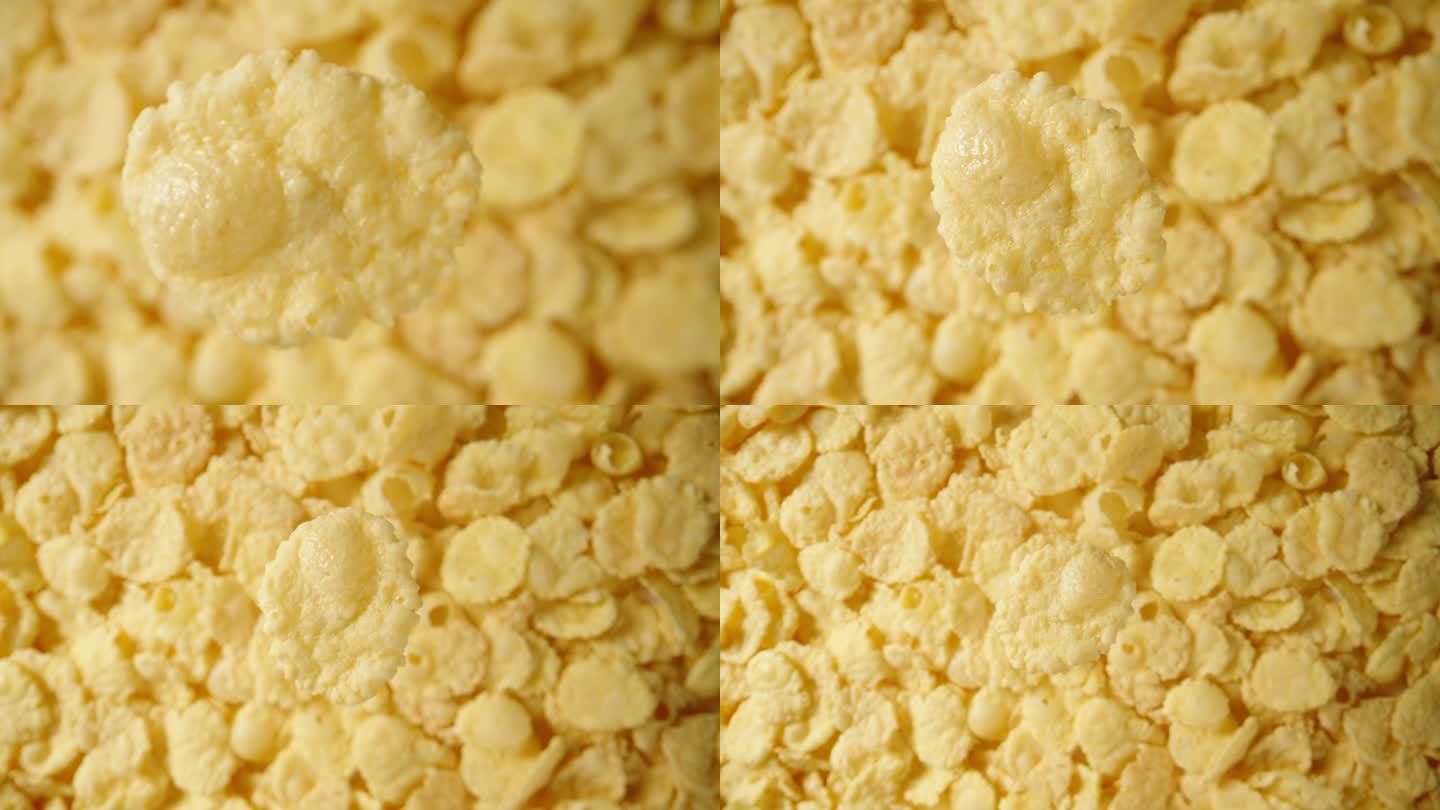 模仿一落，概念一落。早餐的玉米片，从俯视的角度看，在一个特写镜头中，向下落。