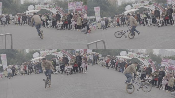活动 自行车 表演 杂技 杂耍 围观人群