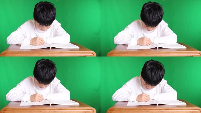可爱的中国小男孩在专心做作业8K实拍