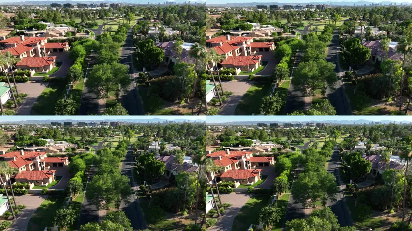 凤凰城附近乡村俱乐部附近的豪宅。航拍创建著名的房子与北凤凰城天际线的背景。亚利桑那州的风景。manh
