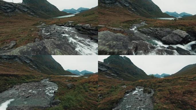 挪威山间河流流向湖泊，航拍FPV图