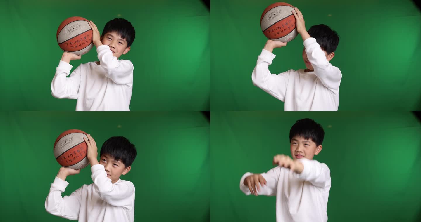 帅气的中国小男孩在玩篮球投篮慢镜头