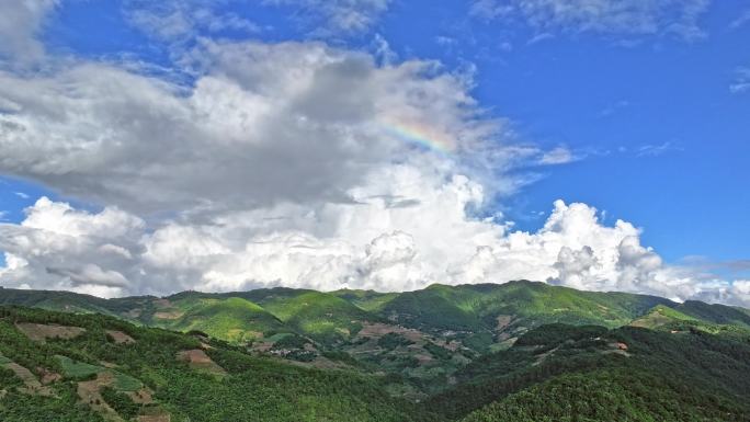 高山蓝天白云彩虹延时