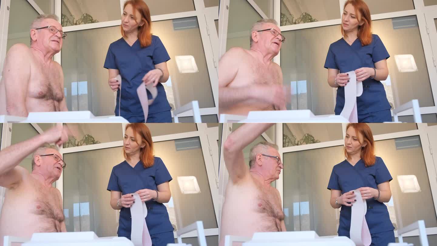 一位专业医生为一位老人做心脏心电图。体格检查