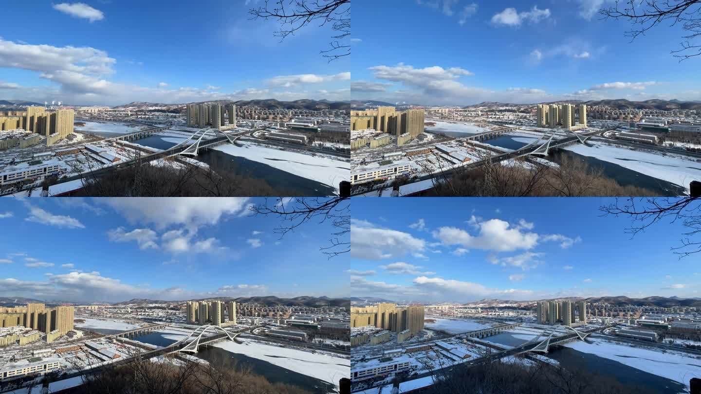 高山上俯拍吉林通化冬季城市延时