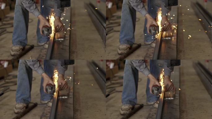 工人使用磨具加工金属材料。研磨加工工具使金属表面光滑。