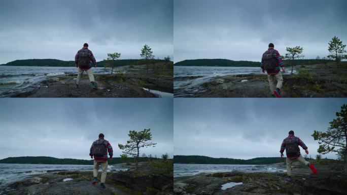 探索斯堪的纳维亚半岛，孤独的人在大自然中旅行，徒步旅行和背包在自然地标