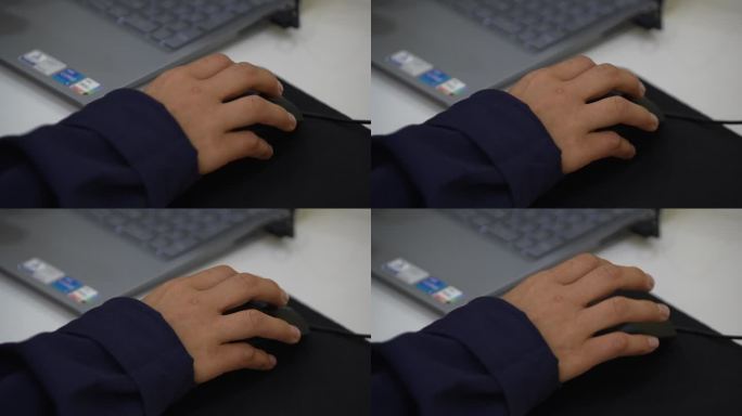 电脑前面工作特写键盘打字按鼠标