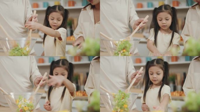 在厨房捕捉快乐:亚洲家庭在一起享受美好时光，教孩子们烹饪和准备新鲜食物的乐趣。